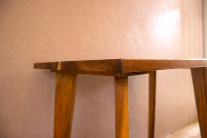 Wooden table with a plain background